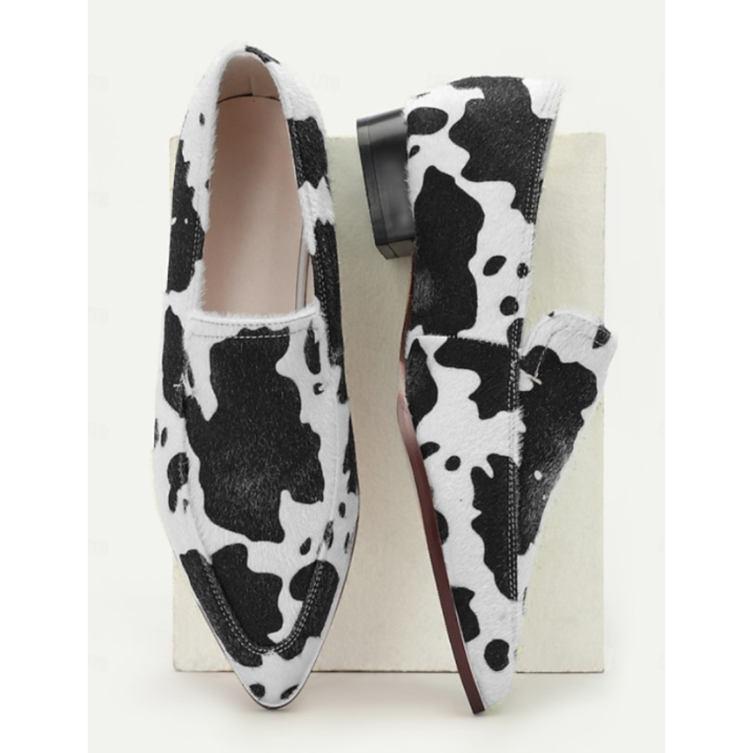 Margot | Elegante Slipper mit auffälligem Kuhfleckenmuster