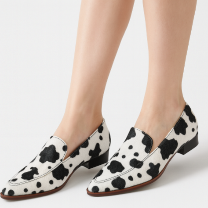 Margot | Elegante Slipper mit auffälligem Kuhfleckenmuster
