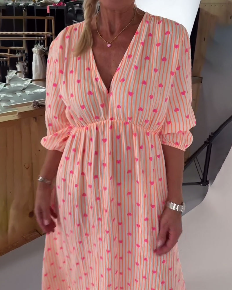 Beena | Elegantes V-Ausschnitt Kleid mit Herzmuster