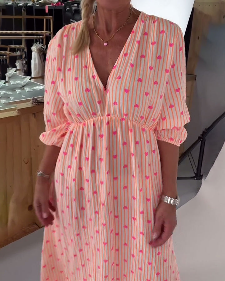 Beena | Elegantes V-Ausschnitt Kleid mit Herzmuster
