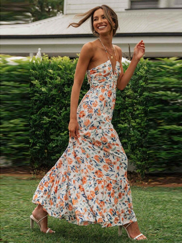 Zeinab | Sommerliche Hochzeitsgäste Kleid Mit Orangen Blumen Und V-Ausschnitt